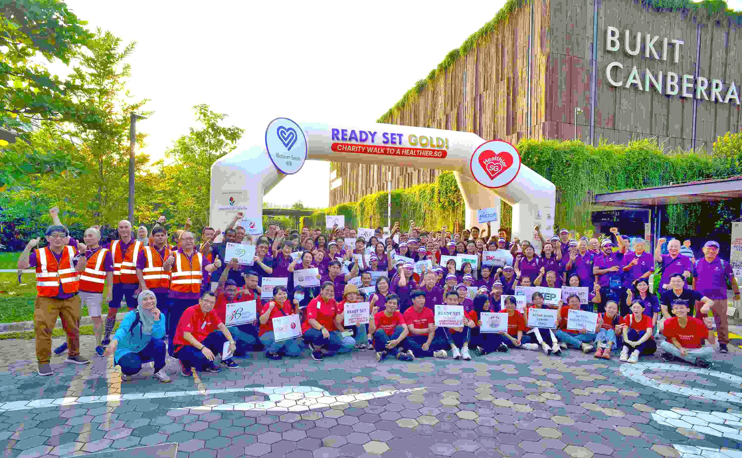 Bukit Canberra RSG arch with volunteers.jpg