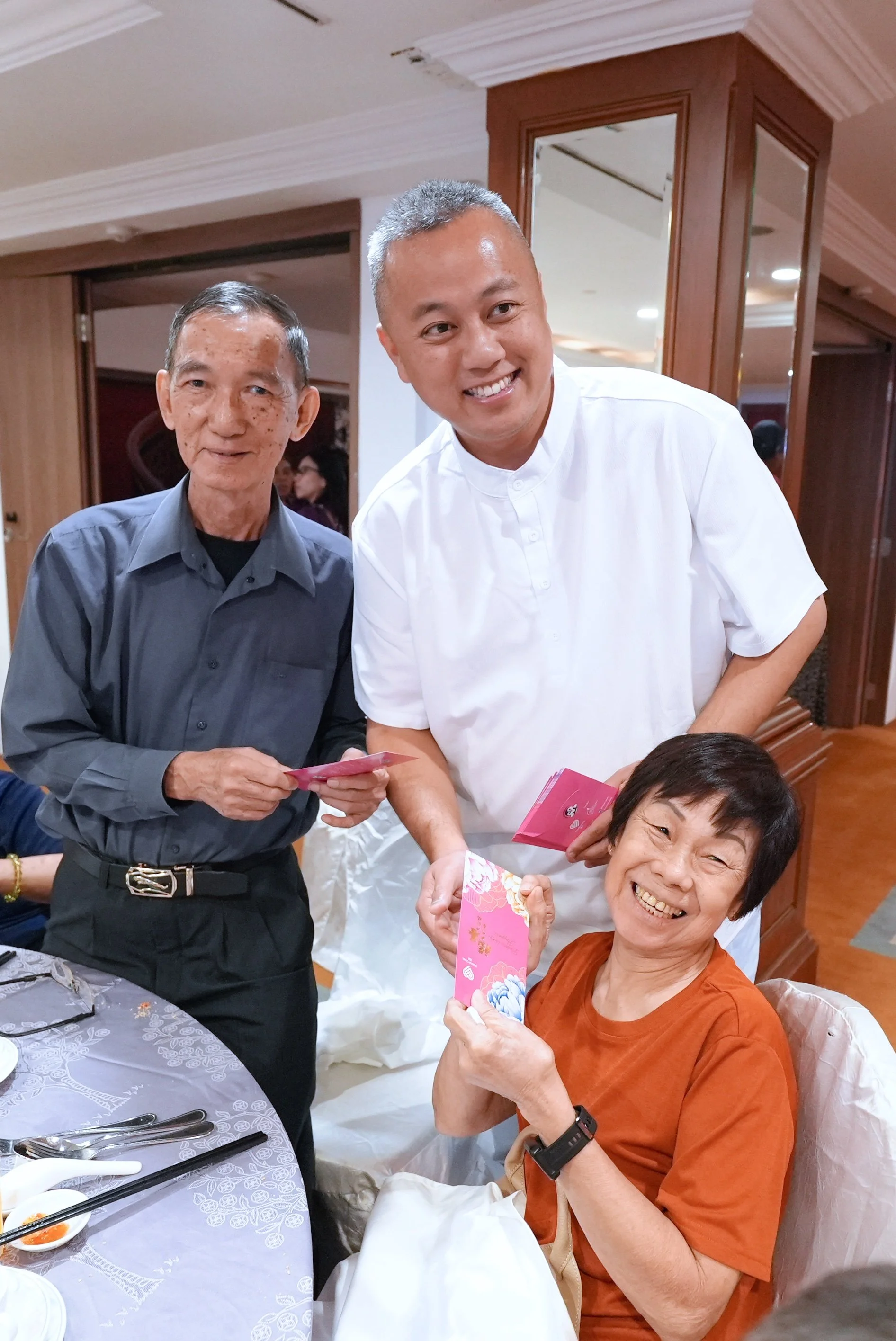 3j. Tao One Andy Ang Pow Distribution.jpeg