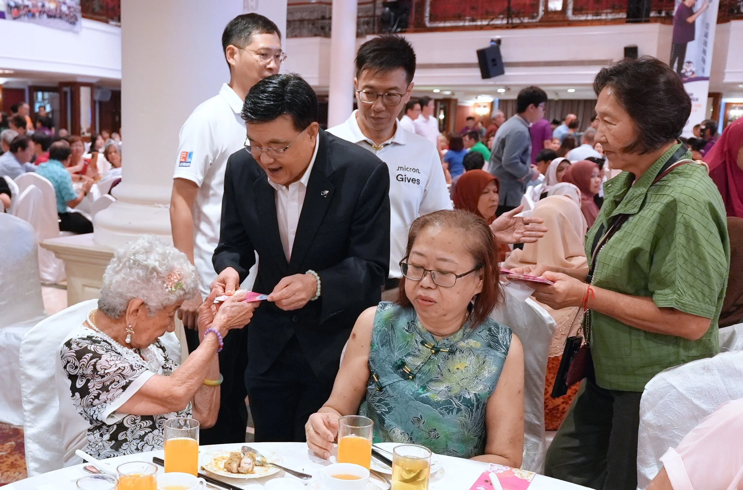 3d Tzu Chi Mr Low Ang Pow distribution.jpeg