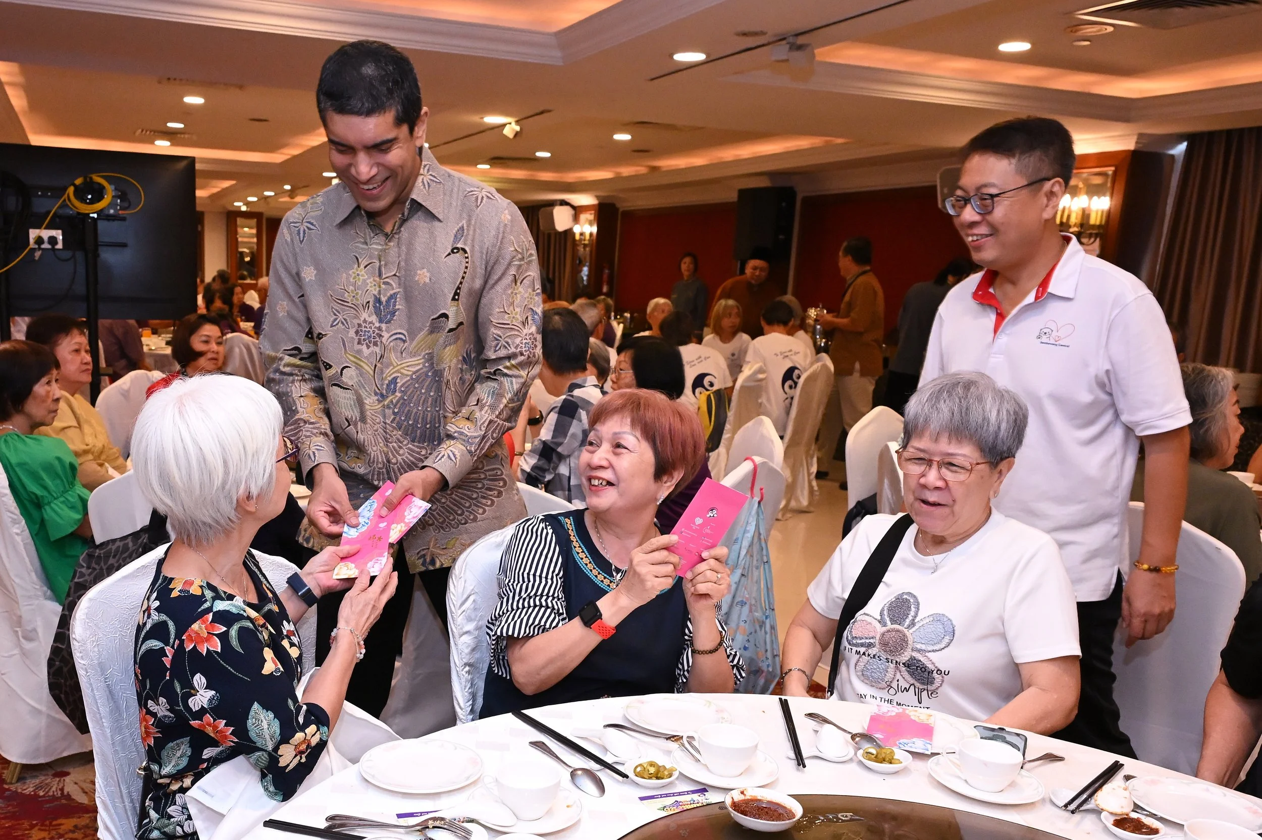 3b Mr Vikram Ang Pow giving.JPG