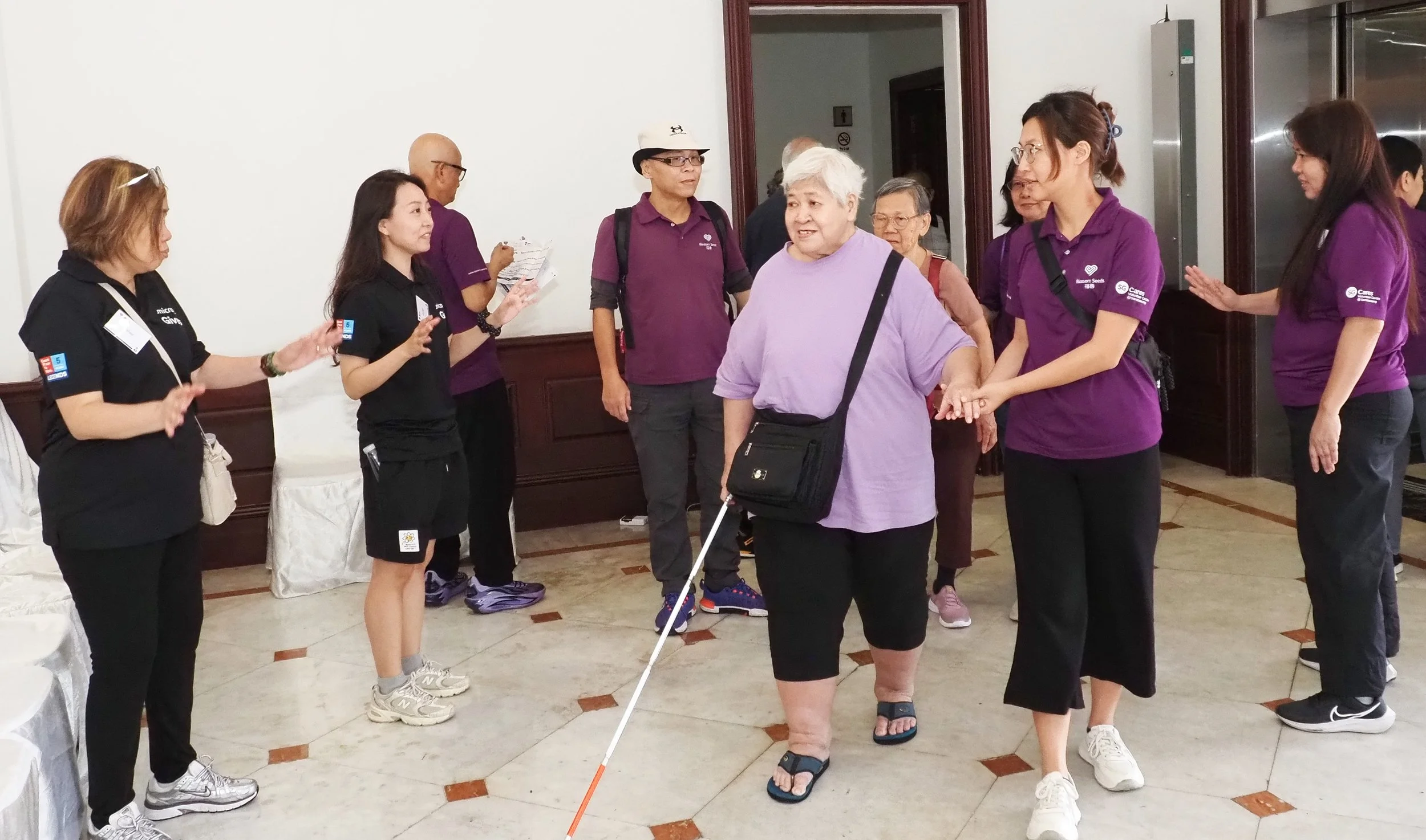 2. Mdm Lai & volunteers.jpeg