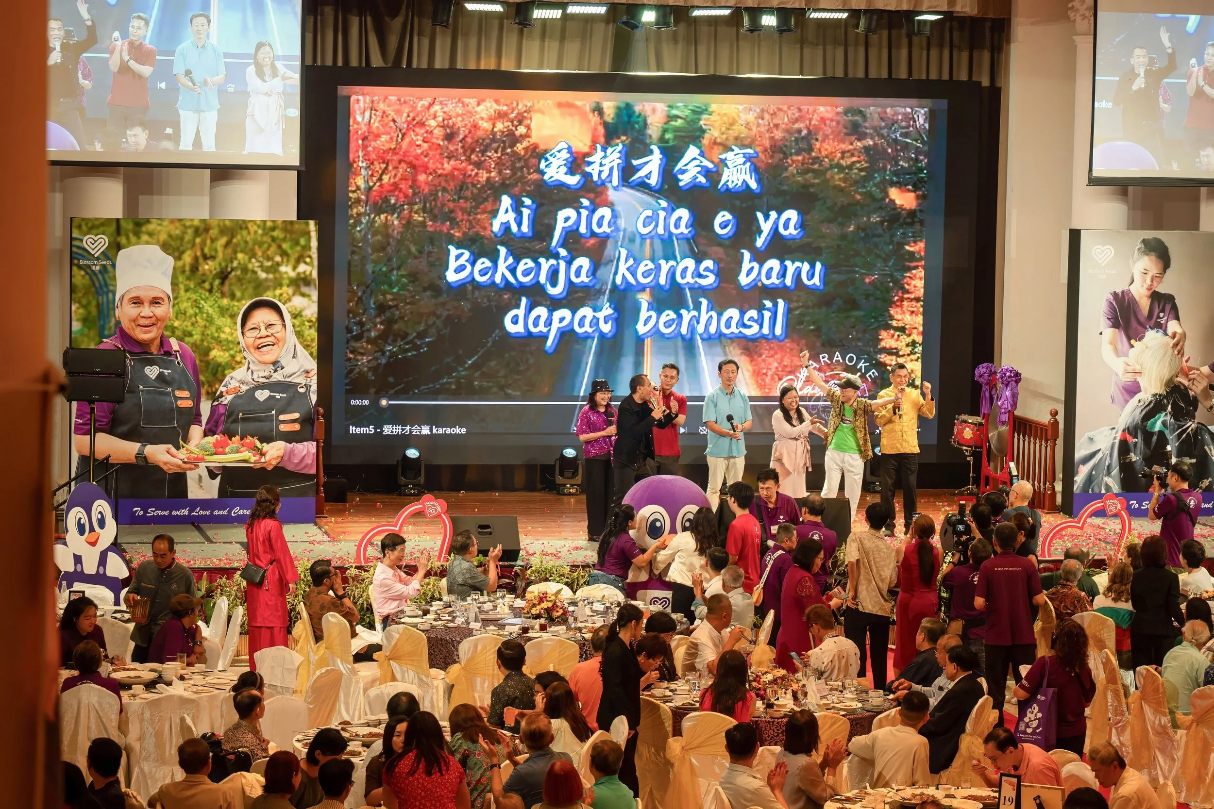 1. Min Ong & seniors singing.jpeg