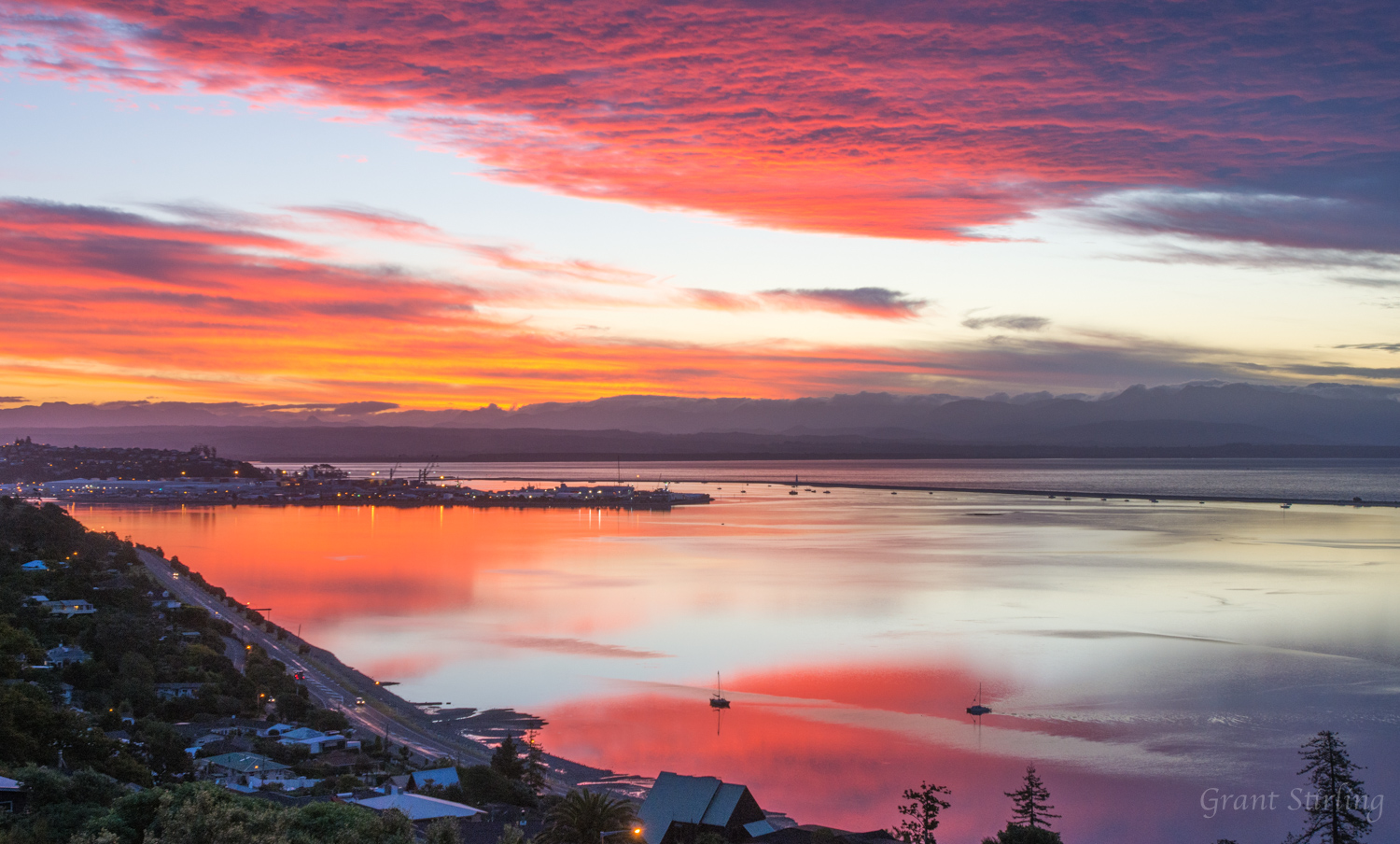 Red sky reflection on Nelson Haven NZ