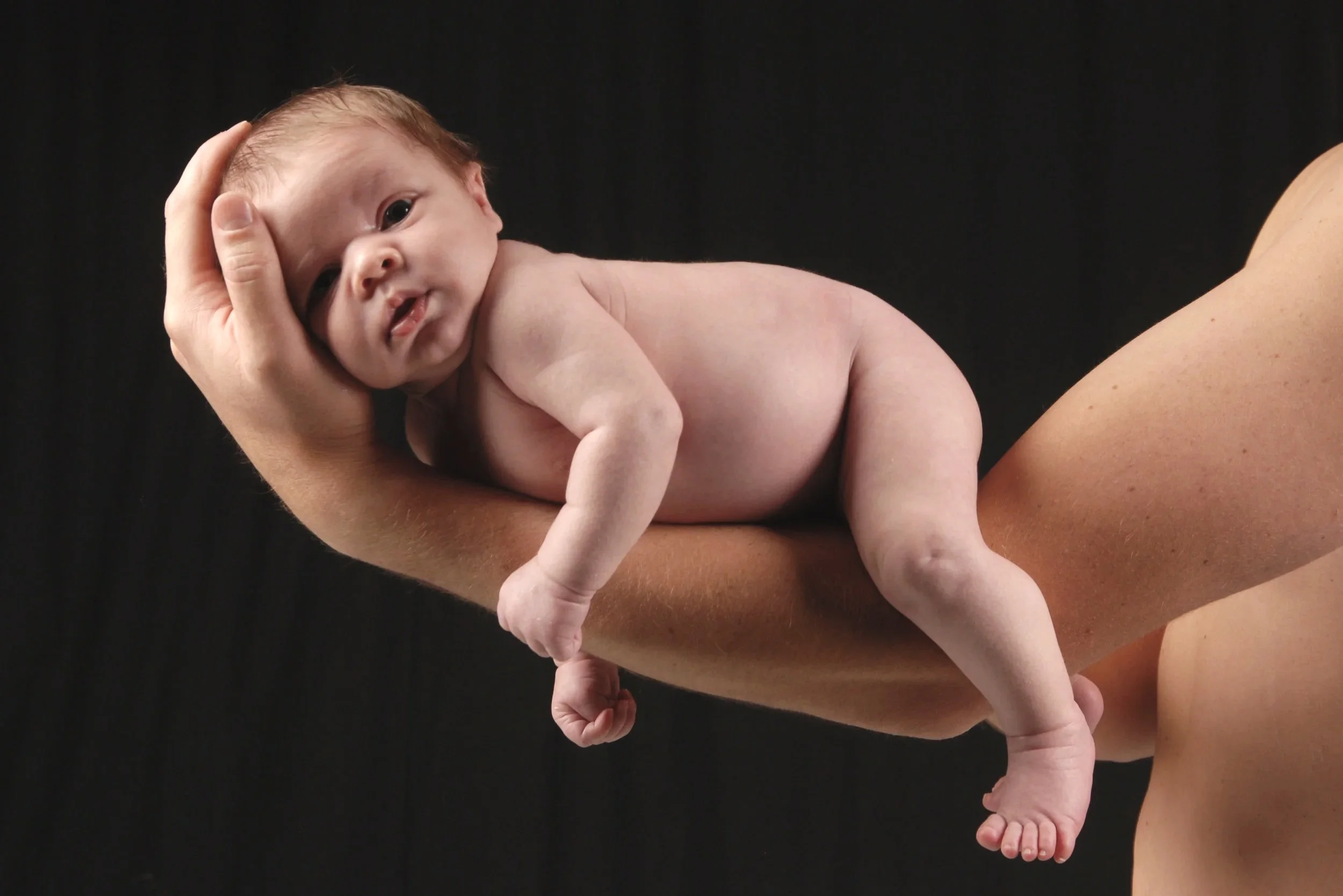 Portrait+baby+on+arm.jpg