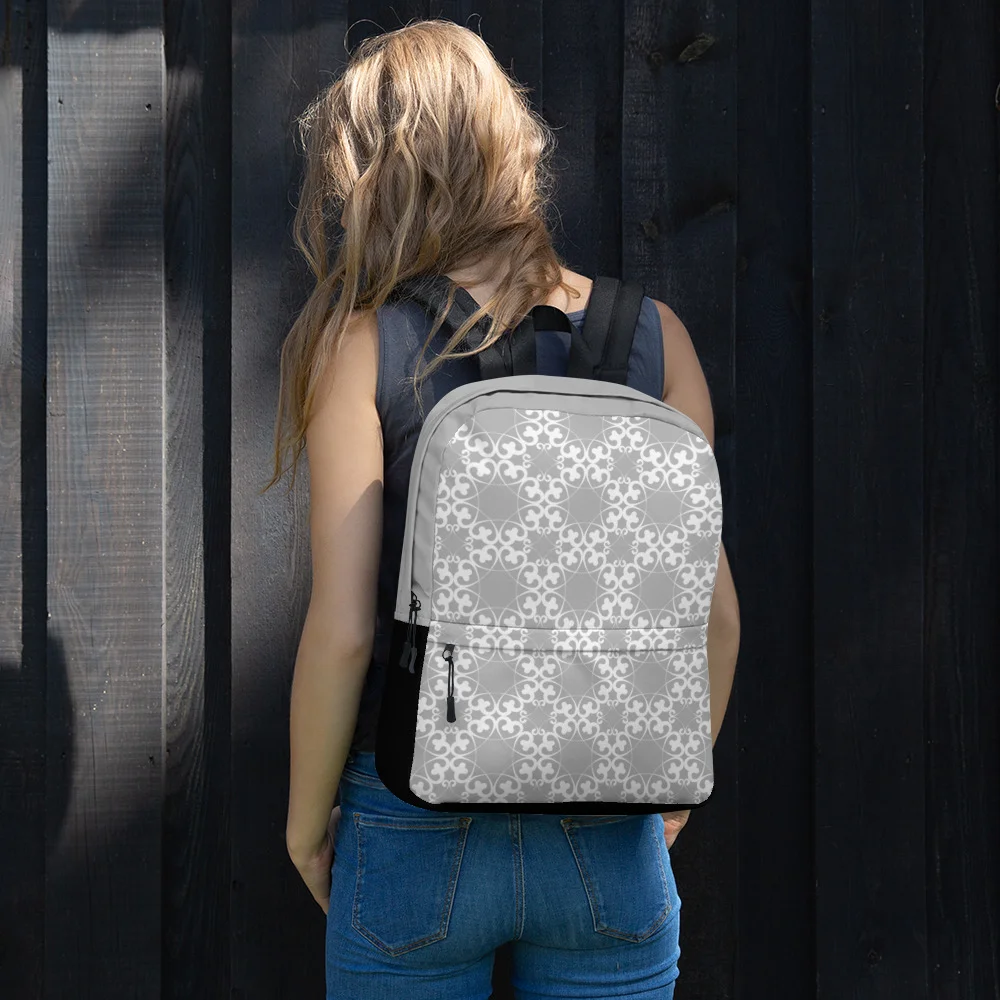 Eightfold-flower-heart-pattern-style-2,-White-on-Grey-and-Black-Backpack_mockup_Front_Womens-Lifestyle_White.jpg
