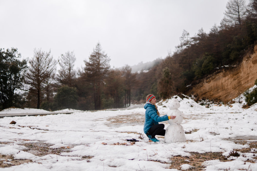 Leah building a snow man :)