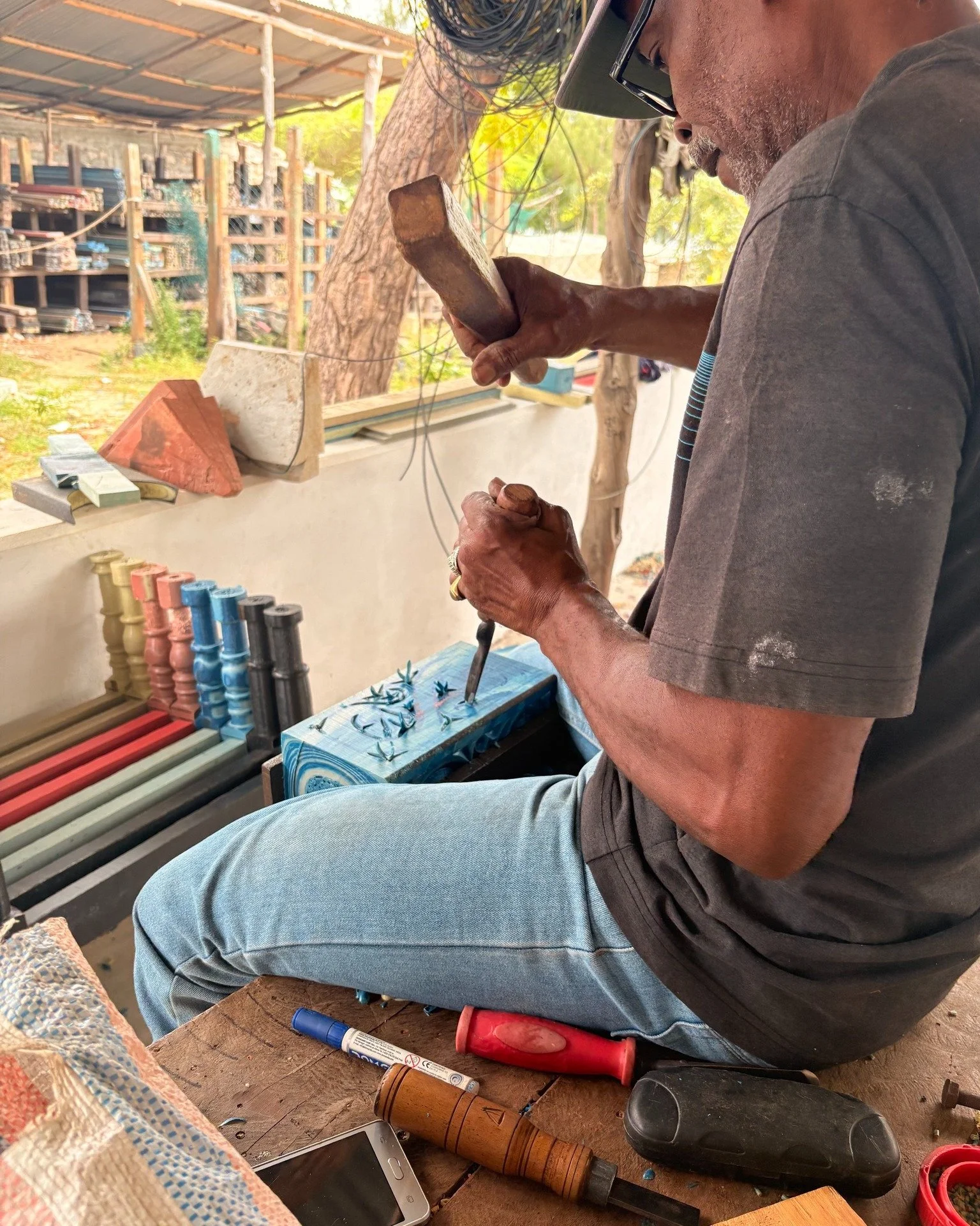 Bayaka is one of Flipflopi&rsquo;s master carvers, shaping each piece with skill, patience and deep respect for his craft.

Every curve and detail reflects years of knowledge passed down through generations, now applied to an entirely new material &m