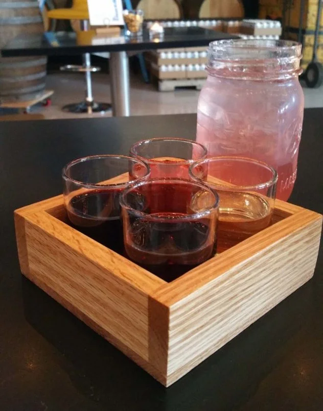 Get a flight of all four wines for $6.50, or the weekend’s specialty cocktail. Photo by Angie Bryan