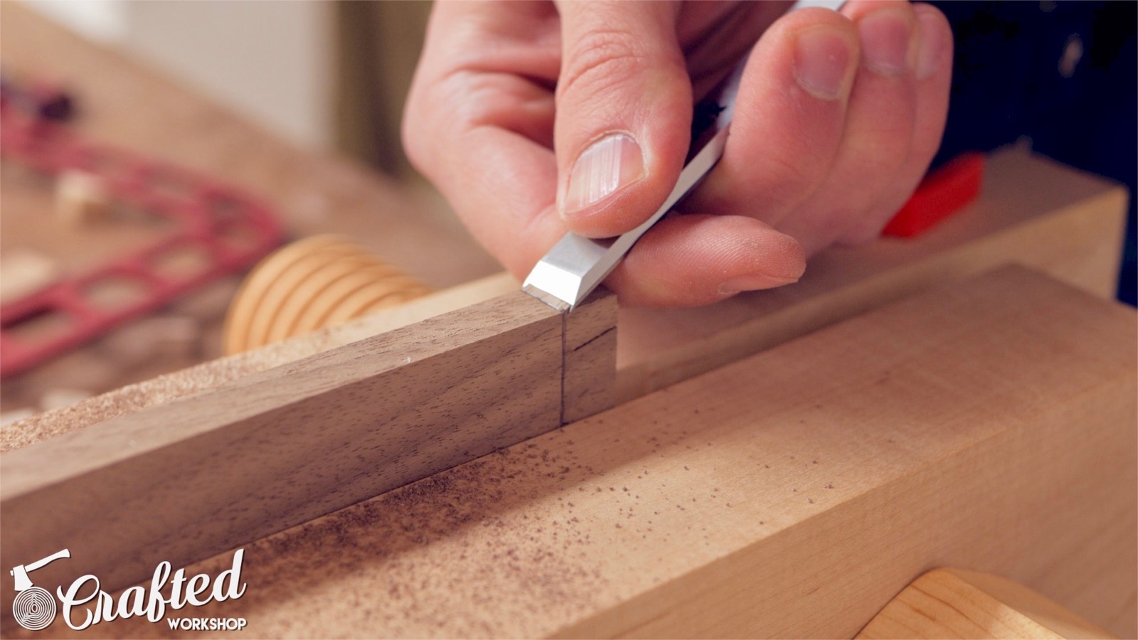 using a chisel to establish a groove for a hand saw woodworking