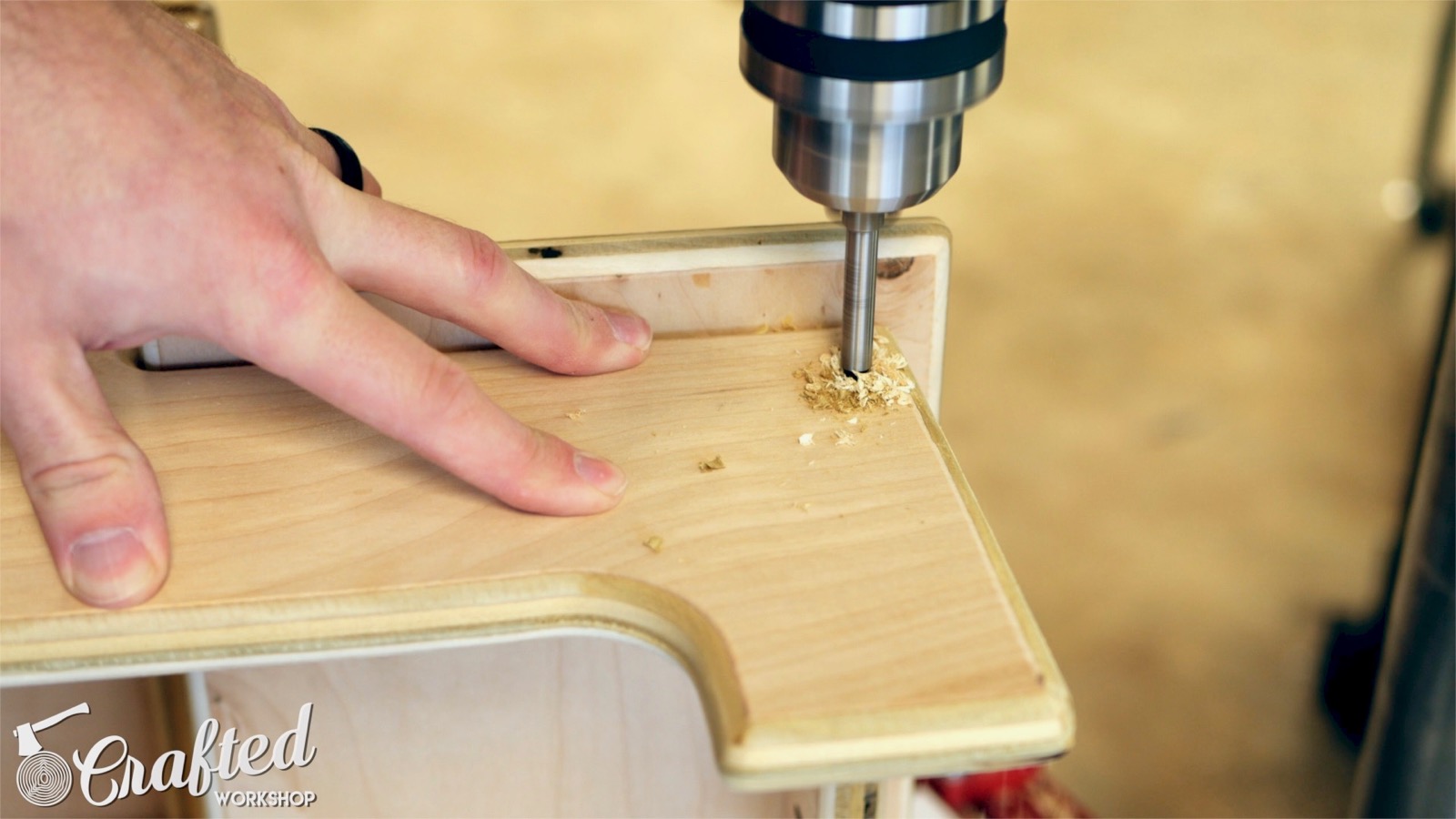 drilling holes into side of plywood for dowels