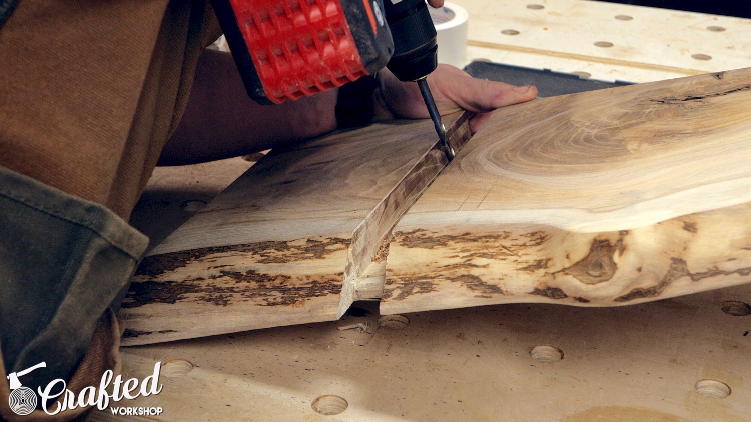 drilling holes to attach metal leg to live edge table
