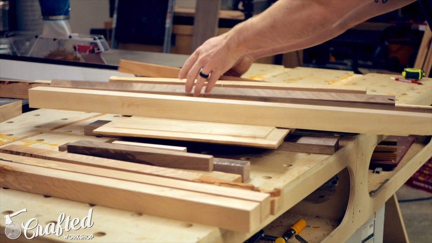 sorting scrap wood to build an end table