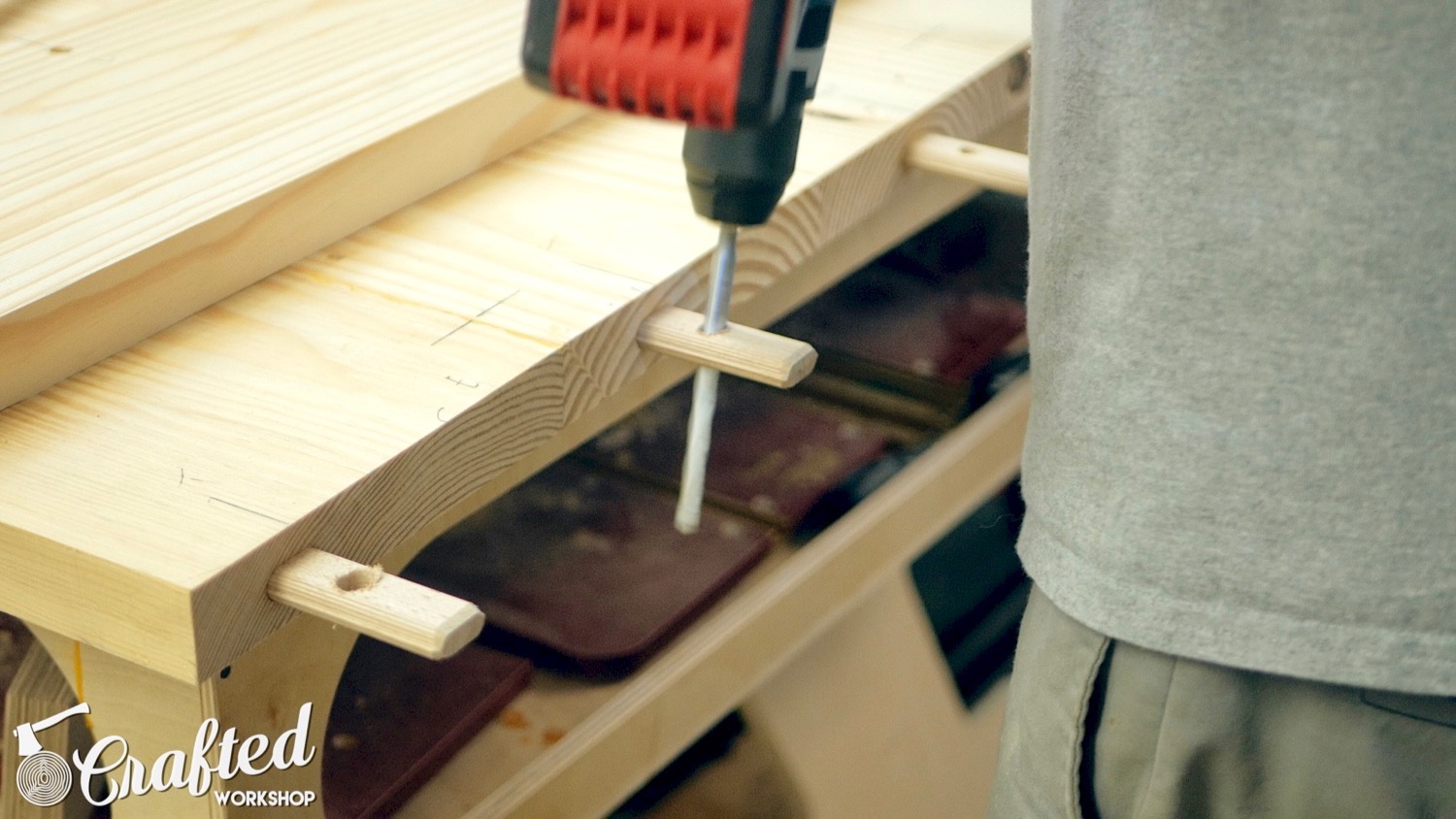 Drilling holes in the Dominos for the drawbored dowel pins. Make sure to widen the holes on the outer two Dominos on each side to allow for wood movement. 