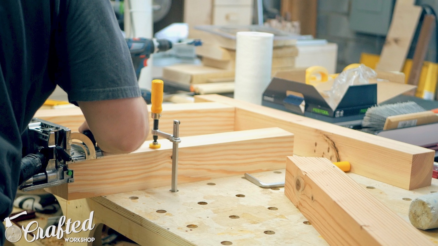 Cutting the Domino mortises in the table base pieces. 