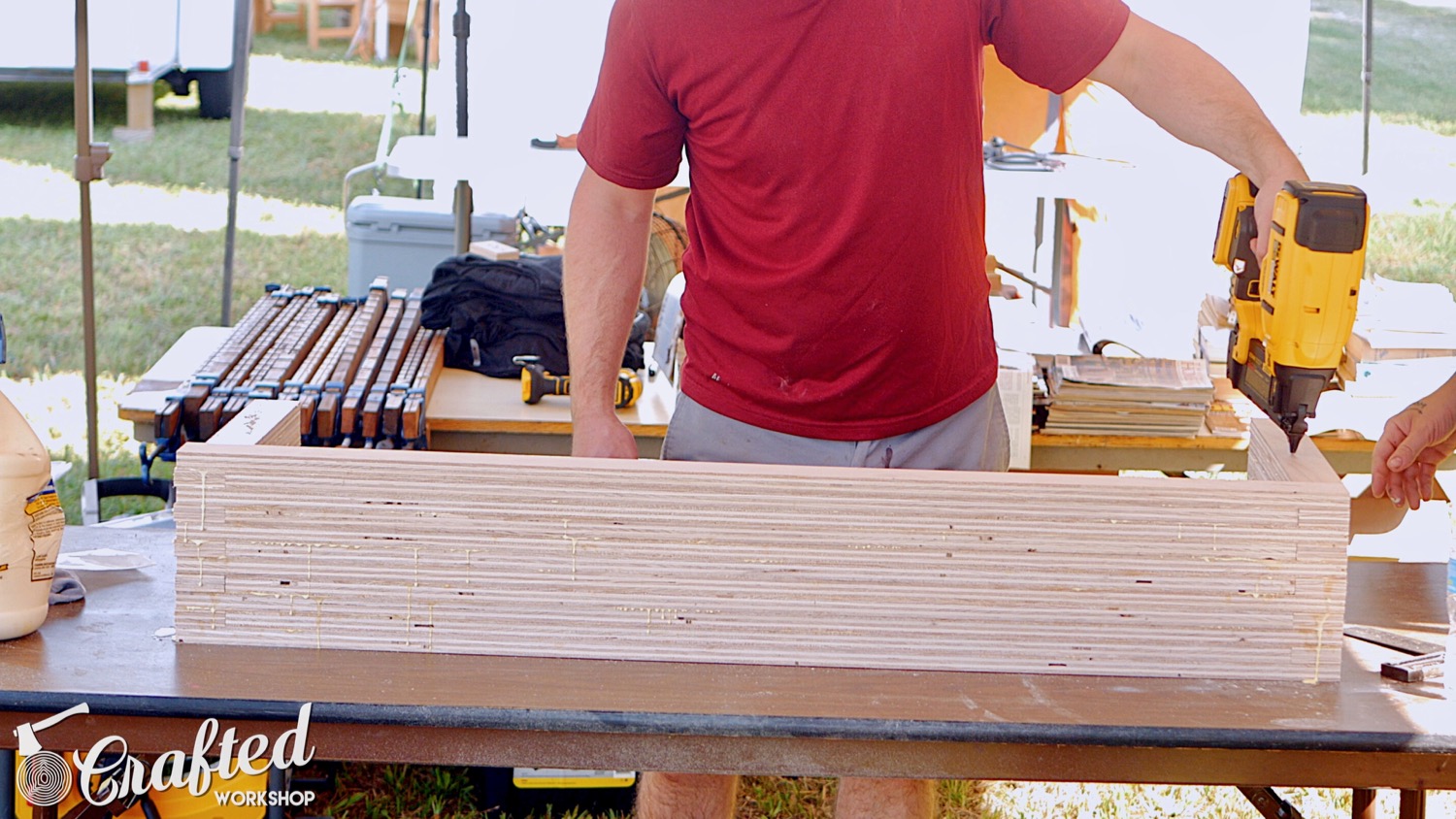 gluing up the diy plywood coffee table using glue and brad nails