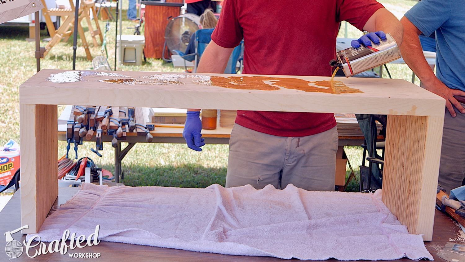 applying minwax wipe-on poly to the diy plywood coffee table.