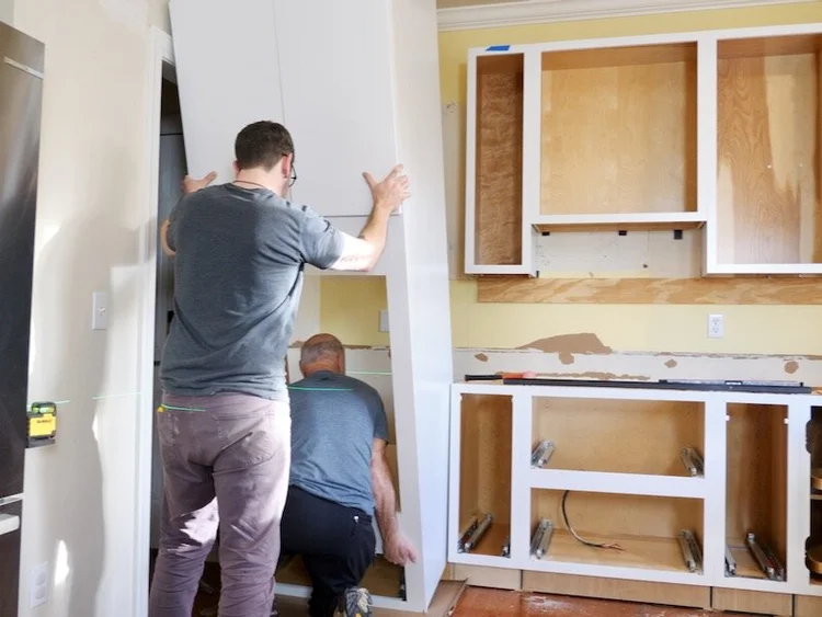 How to INSTALL KITCHEN CABINETS (and remove them)! // Kitchen Remodel ...