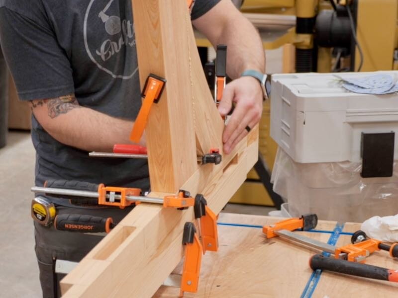 Adding clamps to secure the boat rack during assembly
