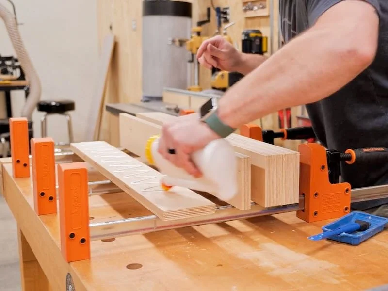 Glueing up double thickness 3/4in plywood for more sturdy fences on the cross cut sled.