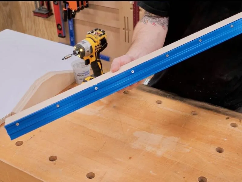 Counter sinked holes to attach the t-track to the cross cut sled fence