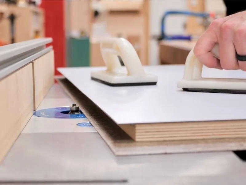 Cleaning up the edges of the laminated plywood
