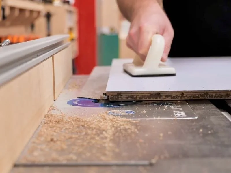 Gumming up the router blade and bearing with contact cement.