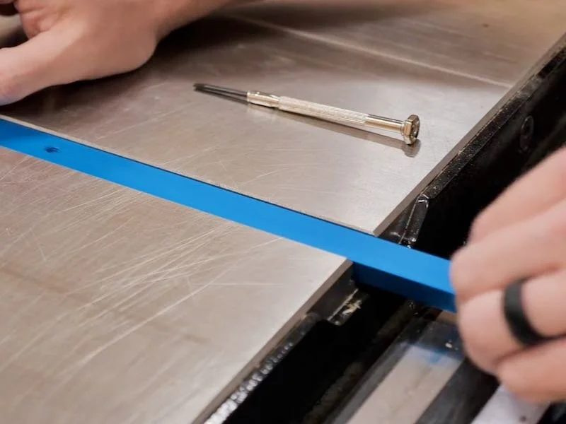 Miter bars with small set screws to allow for a perfect fit on your table saw.