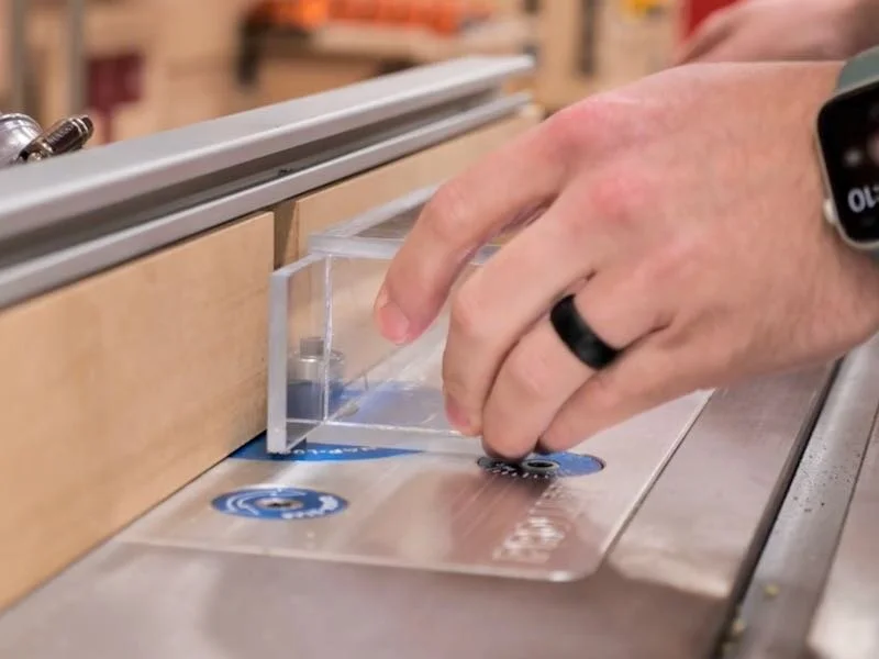 Flushing up acrylic plexiglass at the router table with a flush trim bit.