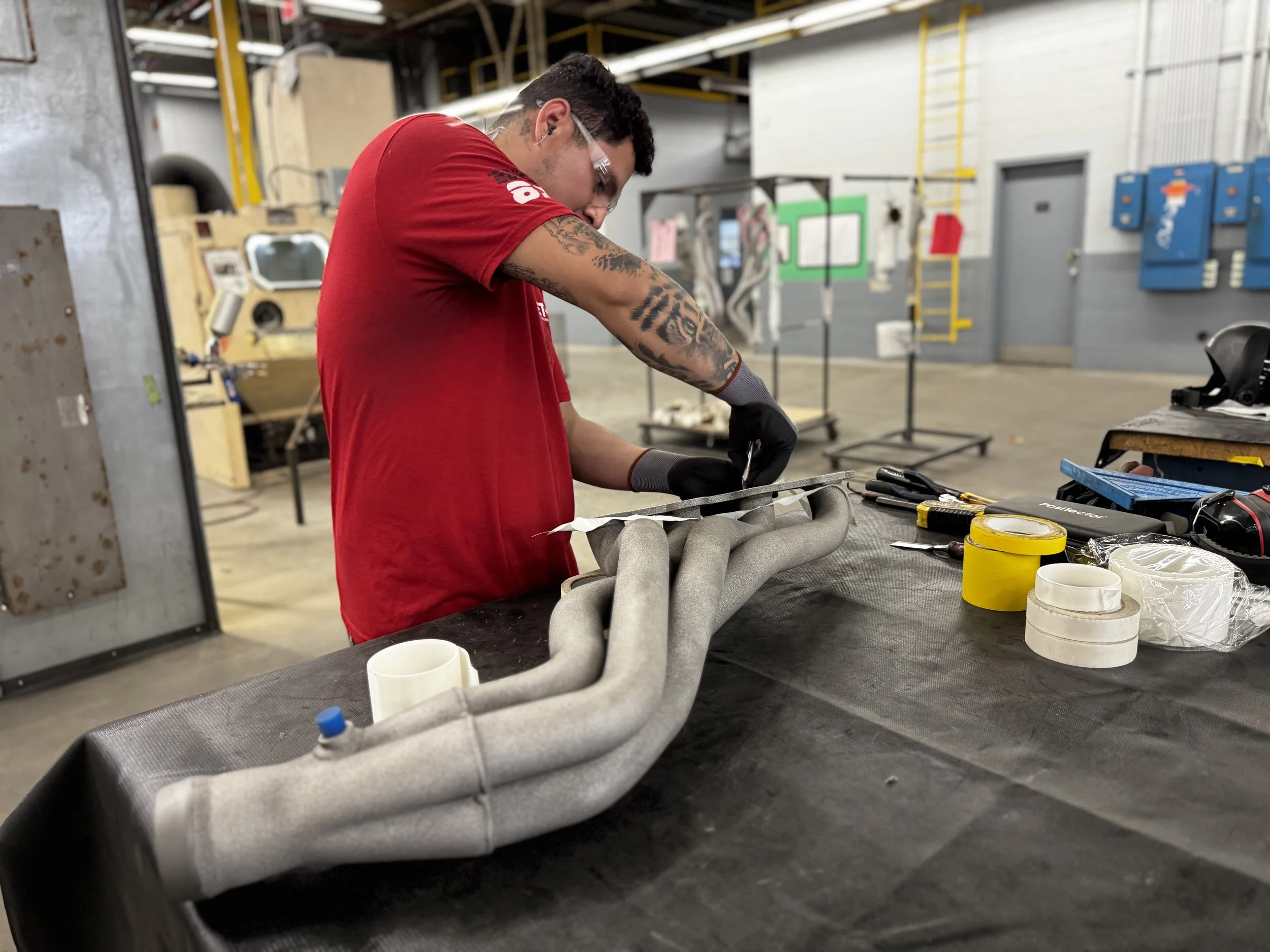 Machined surfaces are expertly masked before 2k application