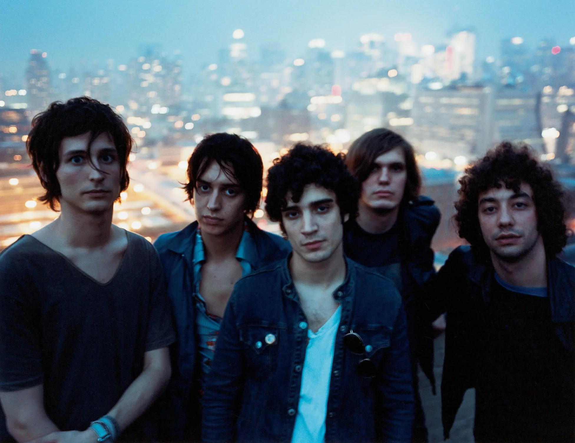 Image Source: Promo photo. Room on Fire, 2003. 