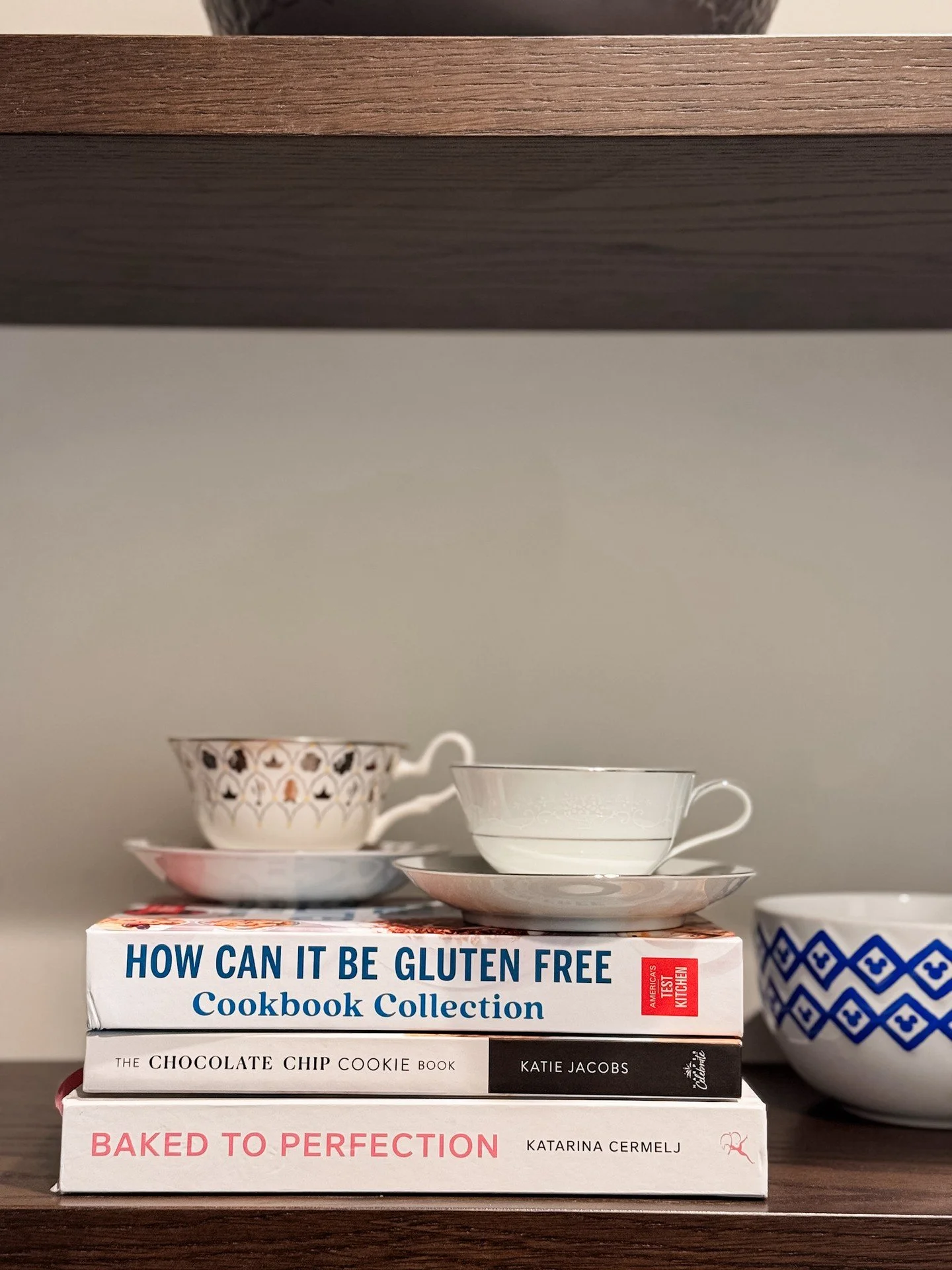 We&rsquo;re all for minimal living, but sometimes that means tucking meaningful things away, only for them to collect dust and bury the memories in a box. What are you storing that you could be styling?

That stack of cookbooks? Top it with a few fam