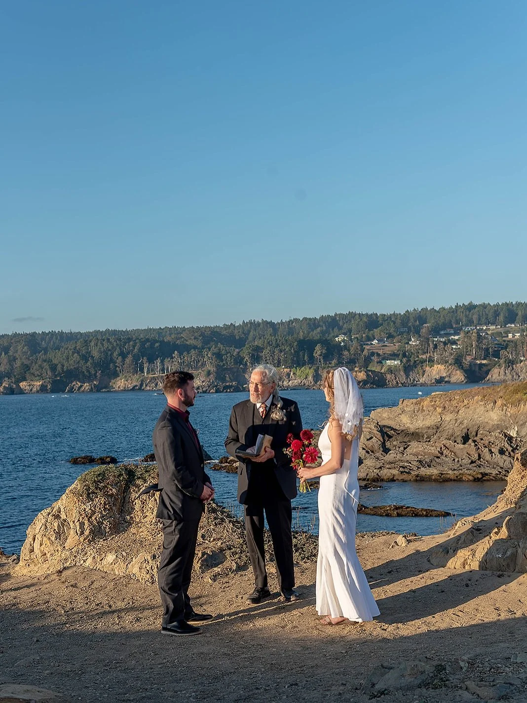They met seven years ago and then ran away to the coast for a summertime elopement at Mendocino Headlands and @nicholson_house . 

I loved the spooky feeling of their cake cutting and the chance to experiment with some artsy shots. 

#mendocinoweddin