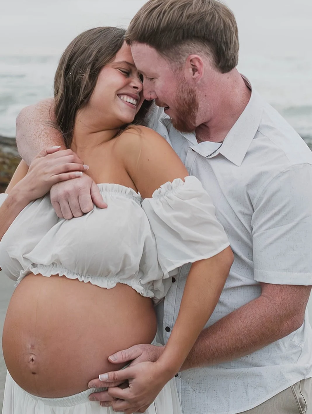 There&rsquo;s something wildly emotional about standing on the edge of the ocean with the person you built a whole life with, knowing the next time everything changes, there will be a baby in your arms.

The fog rolled in. Her dress kept catching the