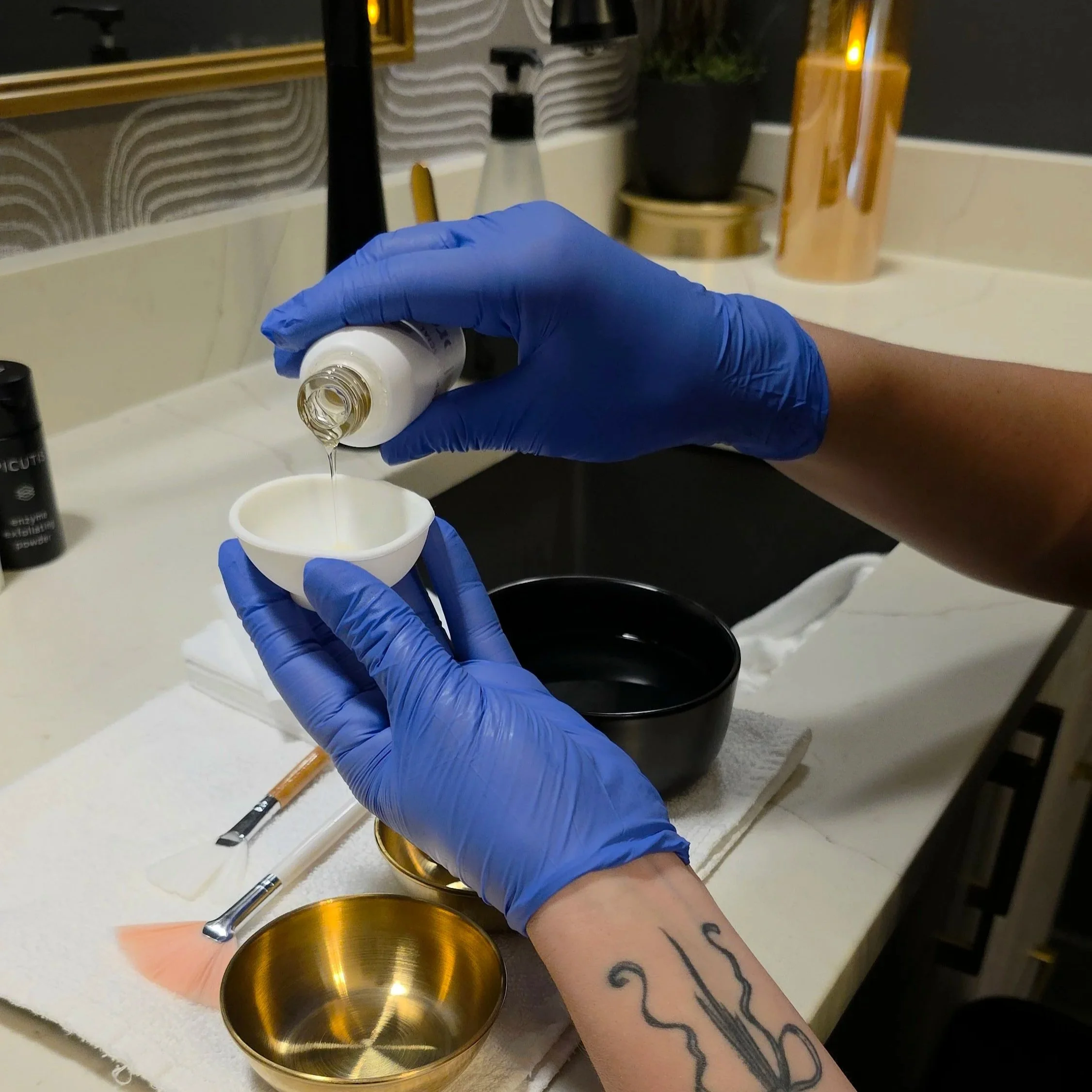 Esthetician preparing The Red Carpet Ready Facial chemical peel