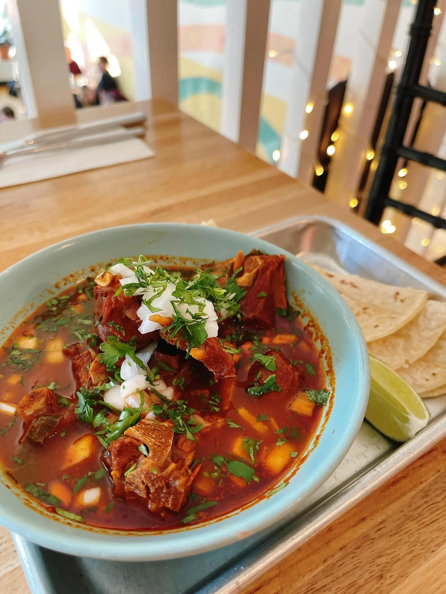 Iris&rsquo;s Guajillo style goat stew, dried chilies broth, topped with cilantro &amp; onion, served with corn tortillas. This is a classic goat stew typically found in Guerrero, in Southwestern Mexico&hellip;and now here in Baltimore. This limited s