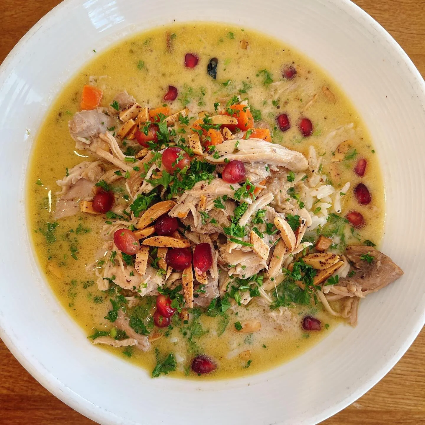 Weekend special: Laban Immo. Seven-spice seasoned pulled chicken stewed in yogurt with jasmine rice, pomegranate and slivered almonds. 

Gluten free, contains dairy, contains nuts (almonds, can be omitted).