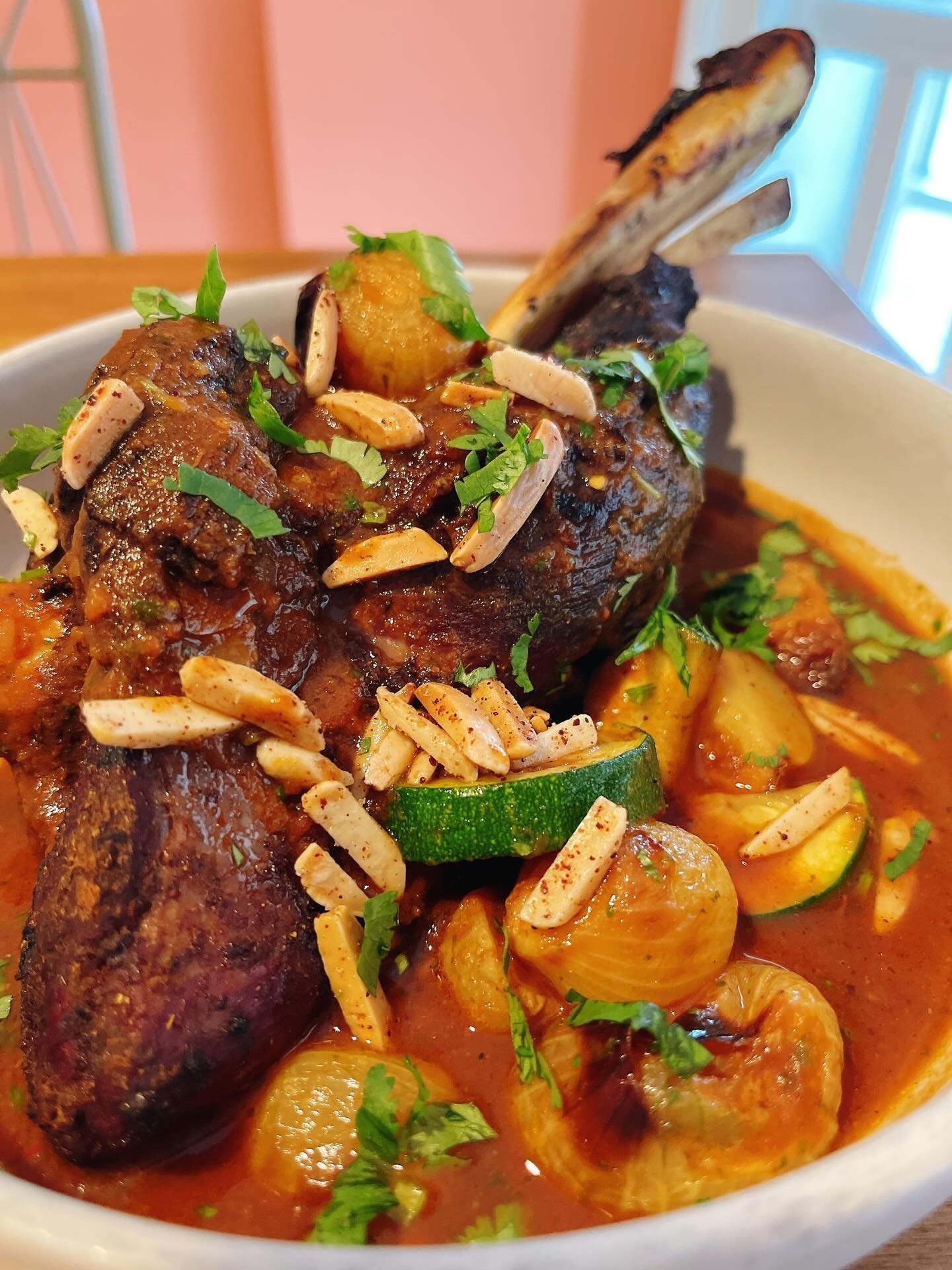New special just dropped. Inspired by a conversation among our team members Salha and Anysa&hellip;Yemeni-Style Lamb Shank, a spice rubbed lamb shank braised in spicy tomato sauce with zucchini, potato, onions,  topped with almonds. Enough for one hu
