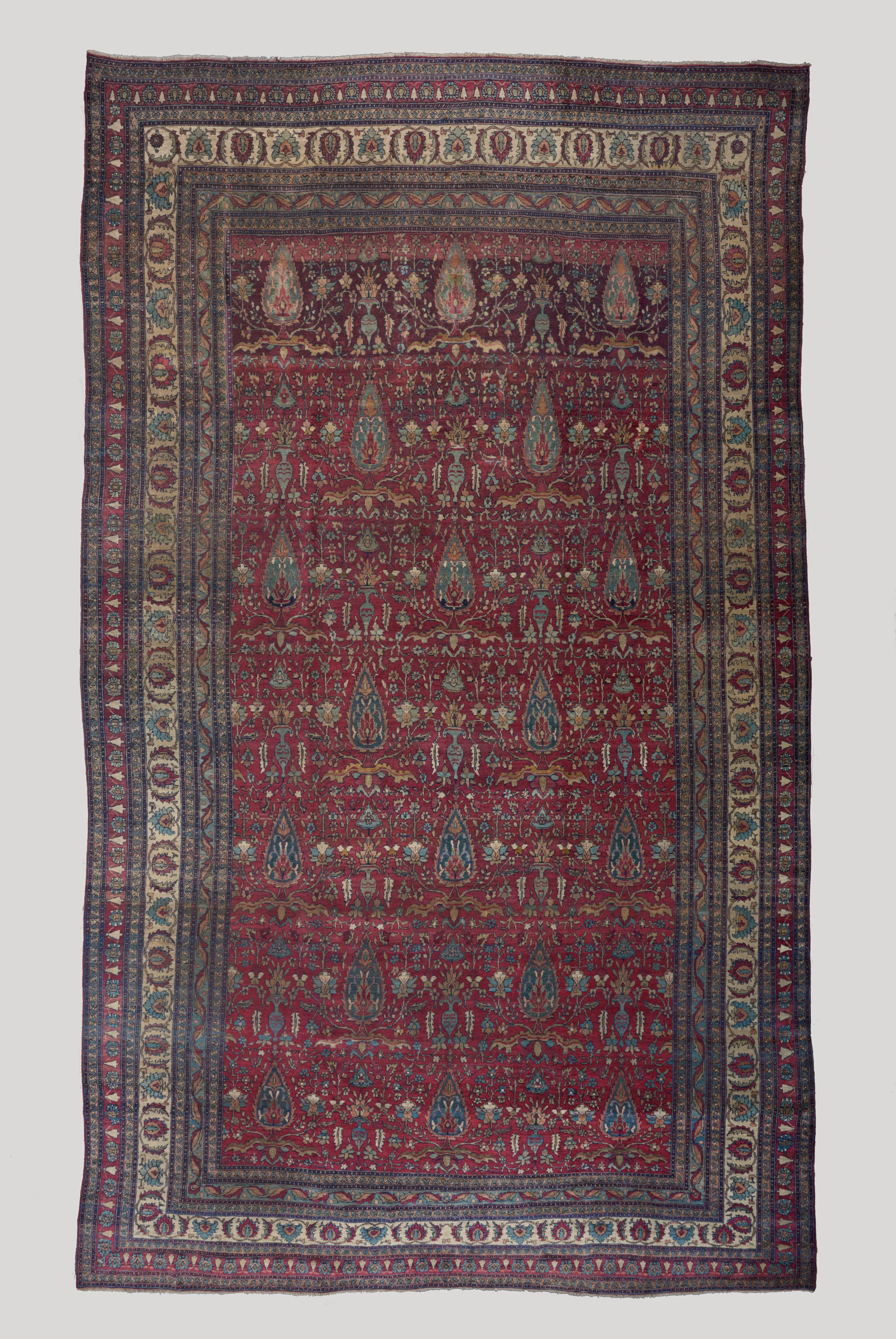 Magenta ground Kerman carpet