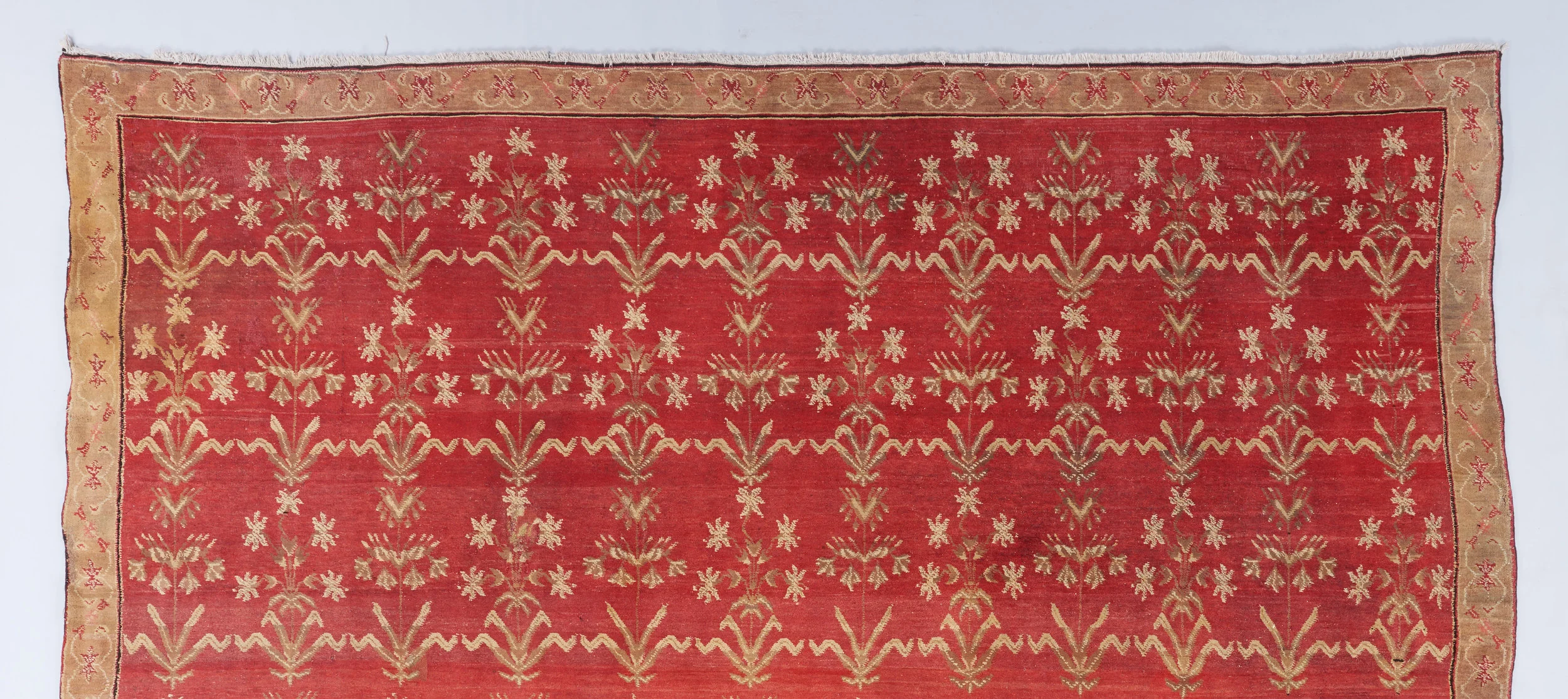 Red ground Agra carpet with Mughal shrub design