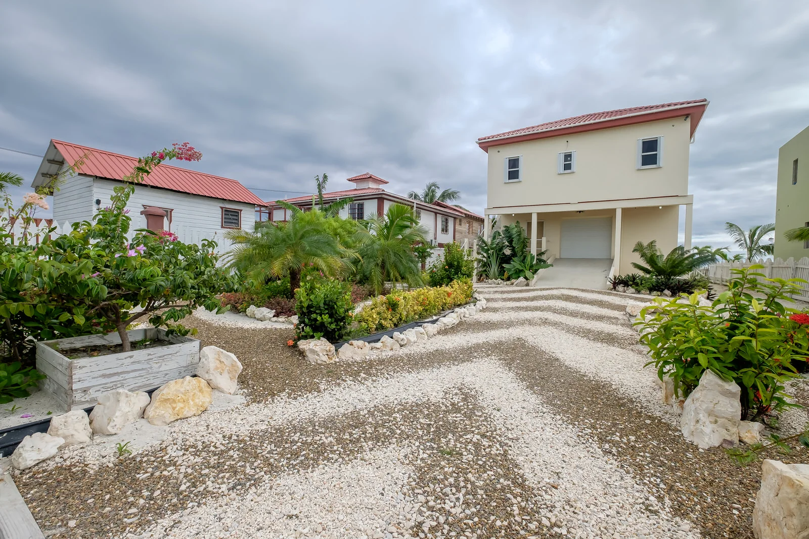 This upper unit is spacious with approximately 1,800 square feet of indoor living space plus a large screened-in veranda with sun shades, gas grill and patio furniture.