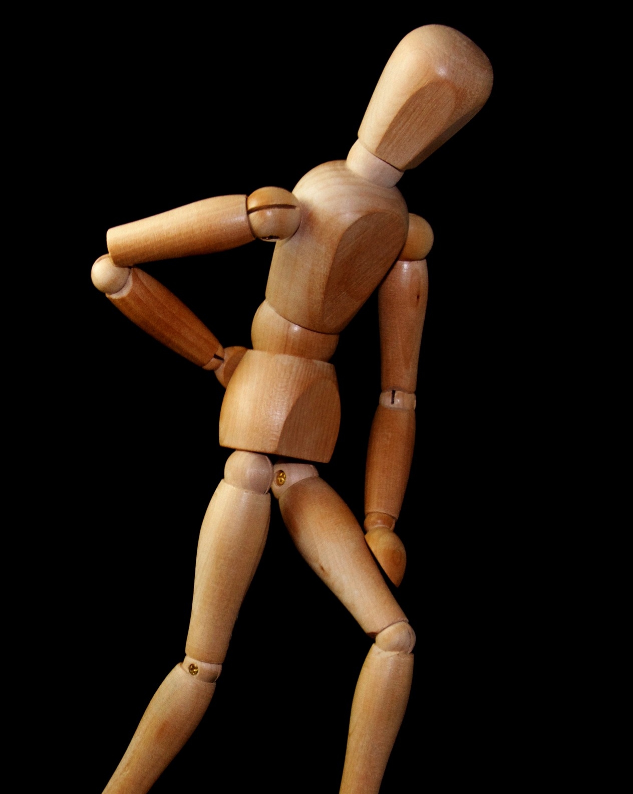 wooden figure man pain.jpg