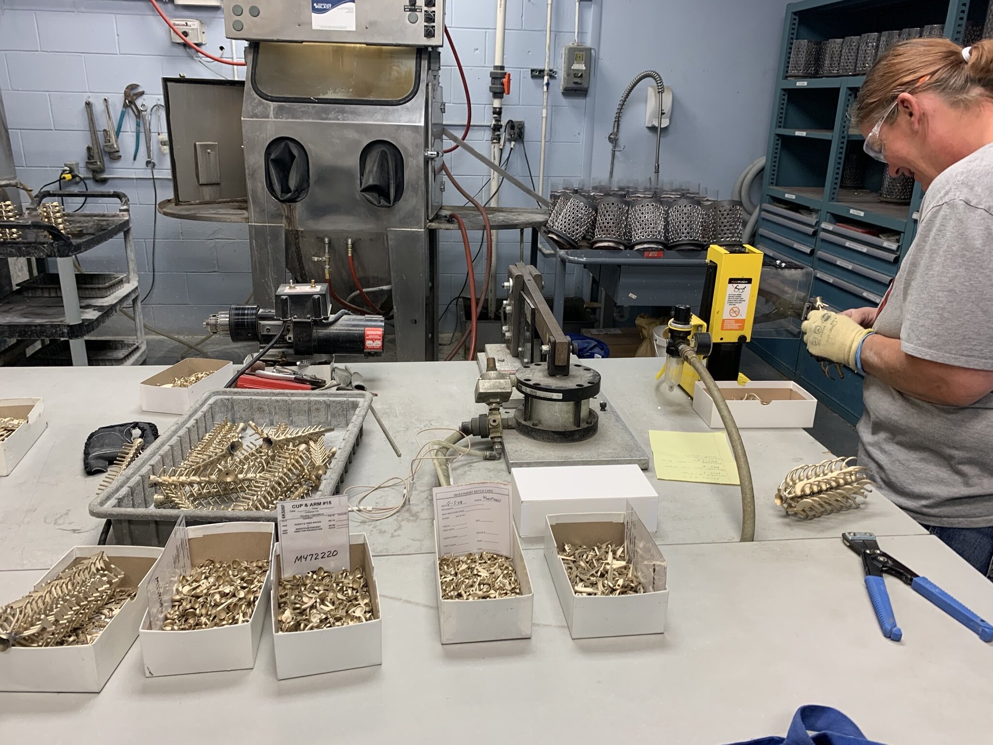 Key trees are the left. Each key must hand-cut off of the tree. The cutting machine is on the right.