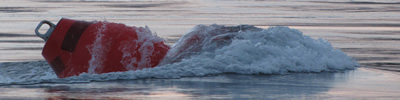Navigation buoy nearly pulled under by powerful tidal currents in Sergius Narrows