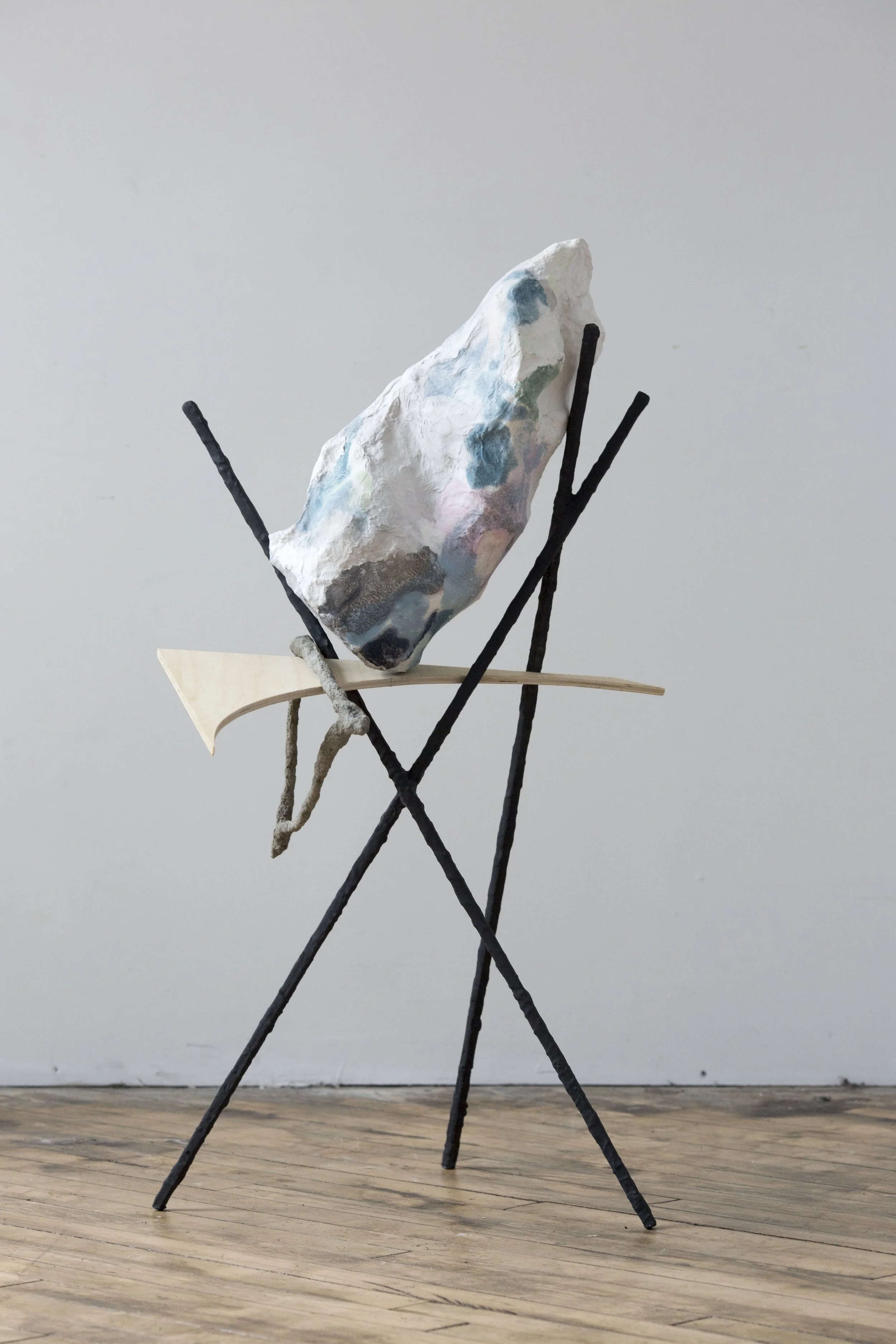 Holes Unearthed 44" x 25" x 25" handmade paper, paper mache, cement, wood, steel, 2017