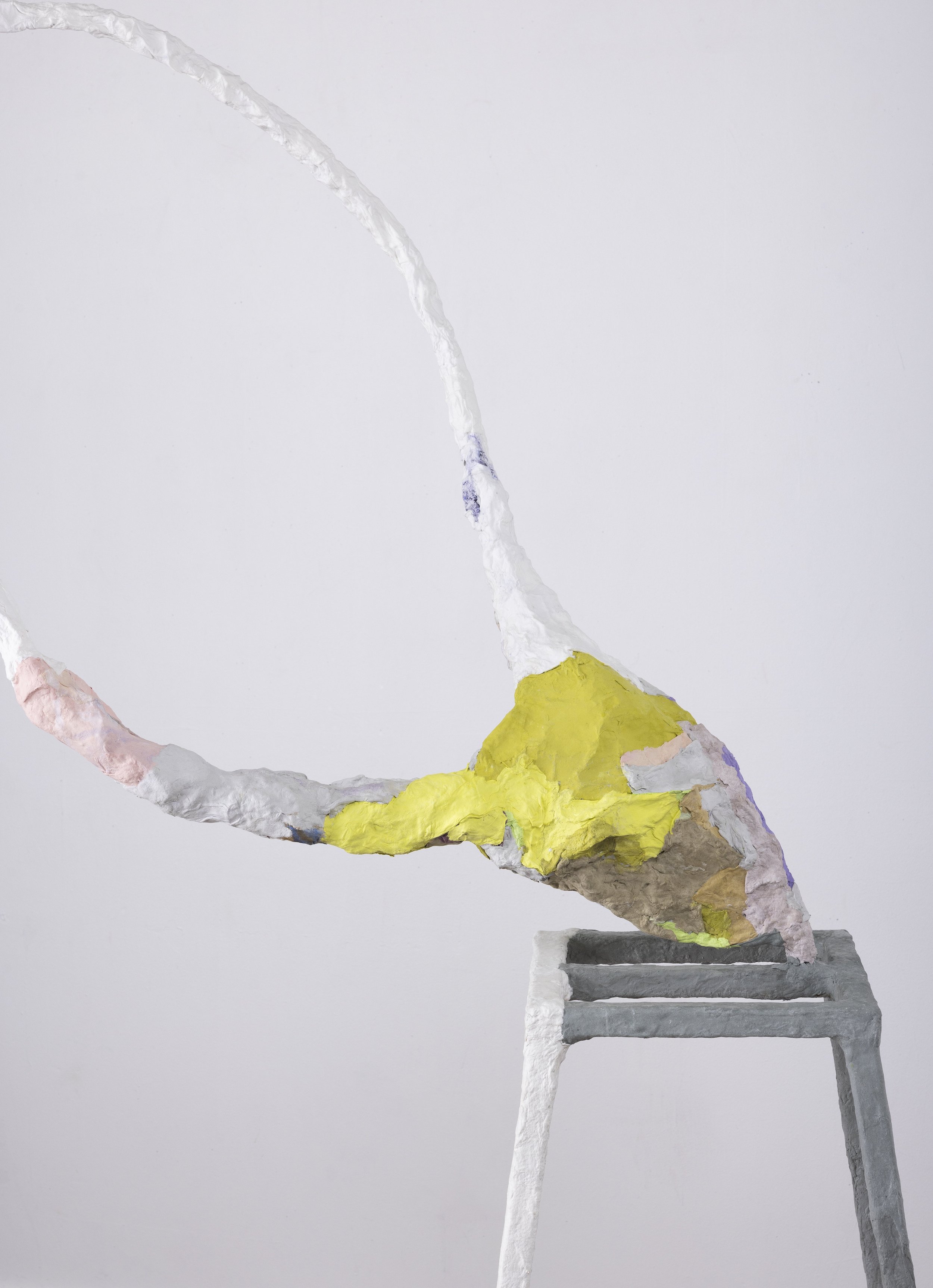 A marigold. A brick. A figure eight. 75" x 20" x 20" handmade paper, pulp paint, paper mache, steel, 2023