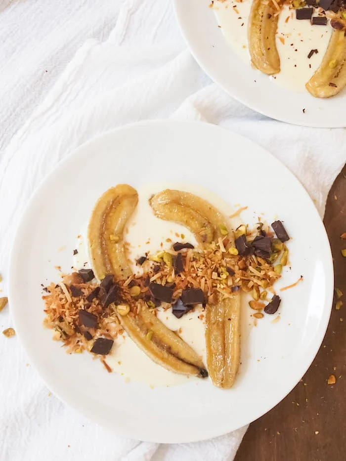 Roasted Bananas with Salted Coconut Cream, Dark Chocolate and Pistachios