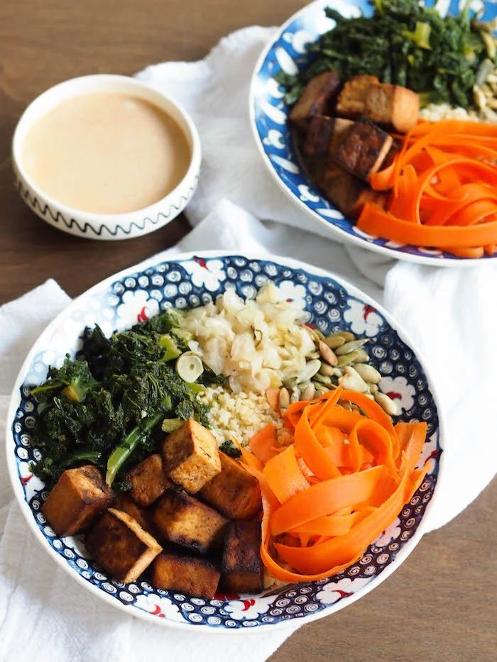 Sweet & Spicy Tofu Millet Bowl with Garlicky Kale and Citrus Tahini Sauce
