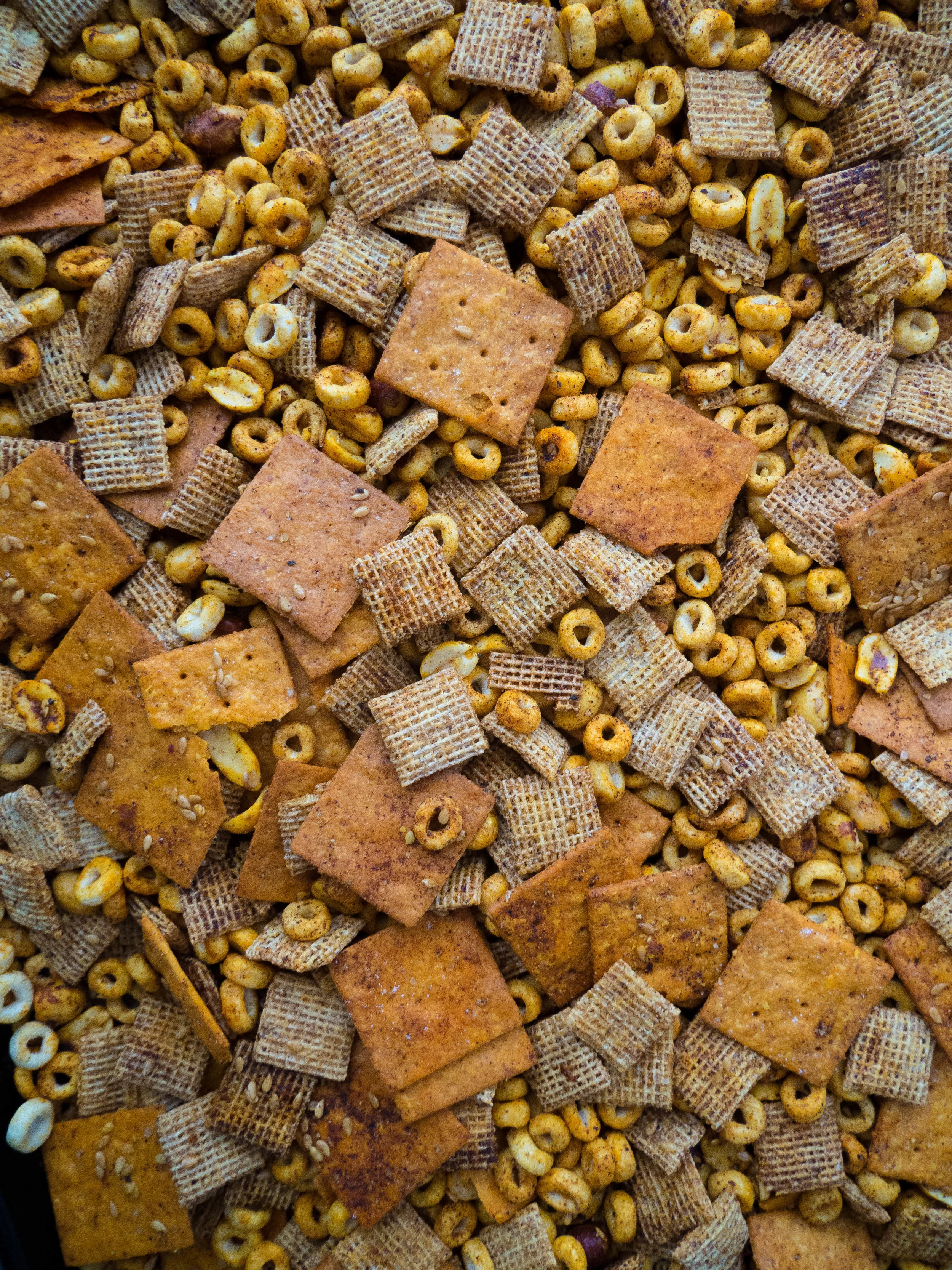 Make this whole grain chex mix as a healthier version of everyone’s favorite snack! With fiber from whole grains plus protein and healthy fats from the nuts, it’s super satisfying, but still has the same smoky and spicy blend of spices that makes chex mix so addictively good! #snack #chexmix #healthysnack #holiday #peanut #healthyrecipe
