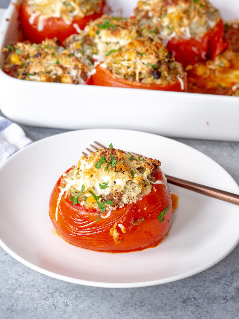 Mediterranean Pesto Stuffed Tomatoes with Rice and Sausage