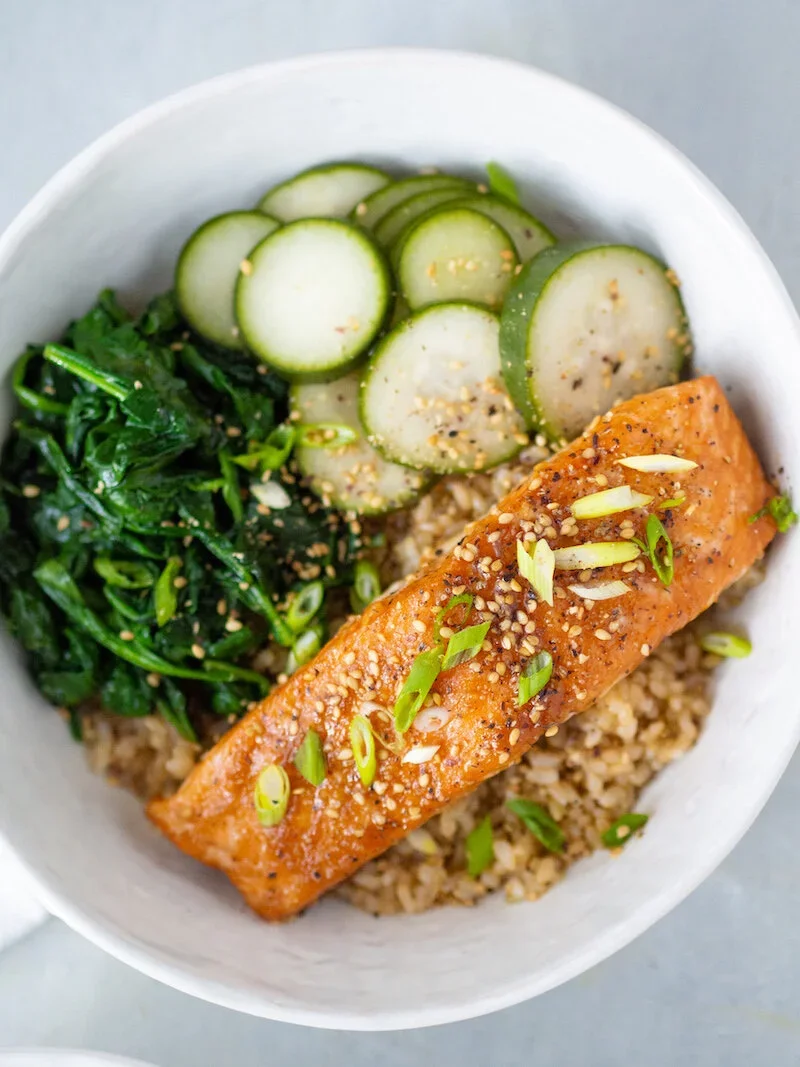 Miso Glazed Salmon Bowl with Garlicky Spinach and Pickled Cucumbers